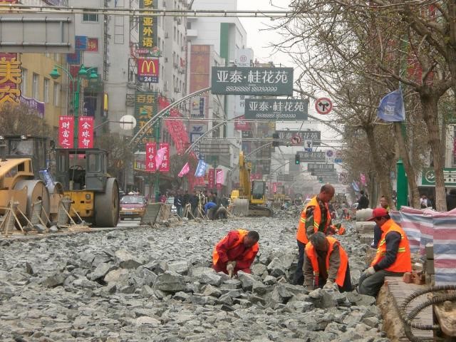 Street repair in China. This is one of the main shopping streets. After less than two weeks they were finished!